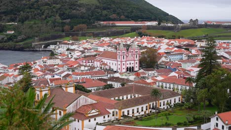 pink cathedral of angra do heroismo with monte brasil in background