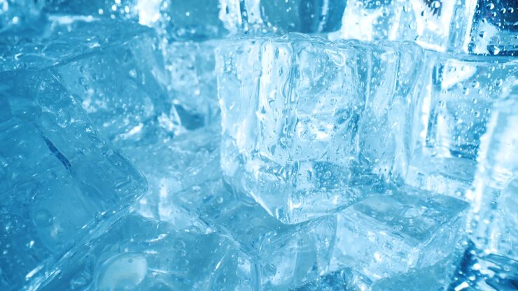 Ice cubes closeup, abstract background.