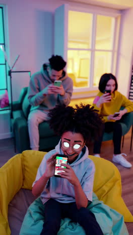 young person using smartphone with ar filter at a social gathering