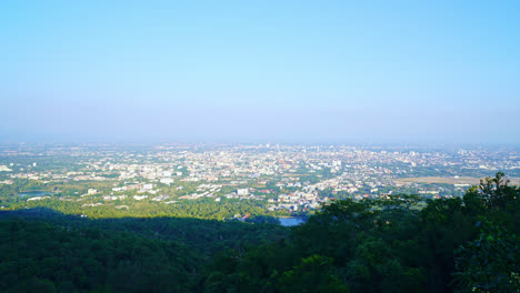 timelapse chiang mai city skyline with blue sky in thailand