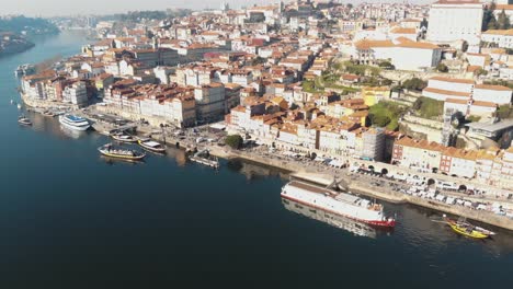 porto old town riverbank 'ribeira' - wide aerial descending shot