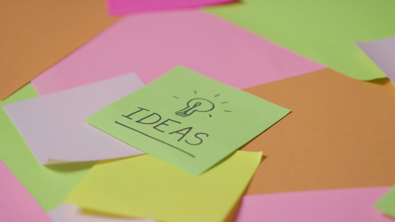 Business Concept Of Revolving Sticky Notes With Ideas Written On Top Note 1