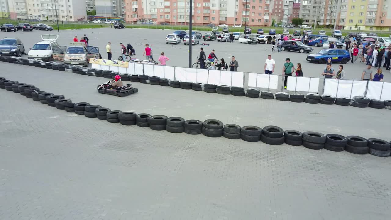 Kart Outdoor Race. VINNITSA, UKRAINE - MAY 2017: Europe Day, kart drivers moving on a go kart track