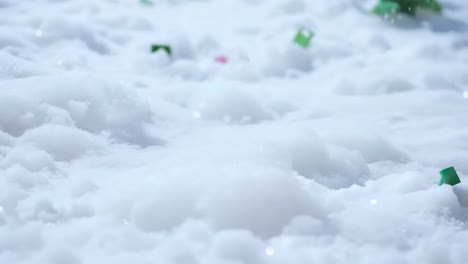 colorful confetti falling on the snow