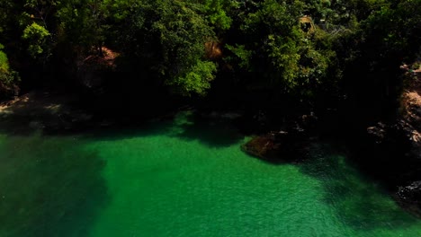 a cliff side beach on the caribbean island of trinidad