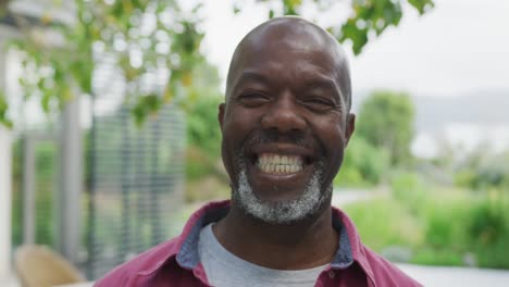 video of happy senior american african men in the garden