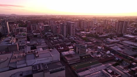 sunset over picturesque city skyline of temuco in araucania region, chile