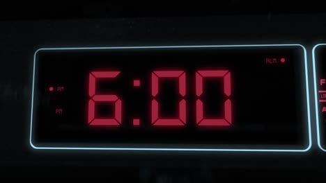 High-quality-CGI-render-of-a-digital-alarm-clock,-with-glowing-red-numbers,-ticking-over-from-5