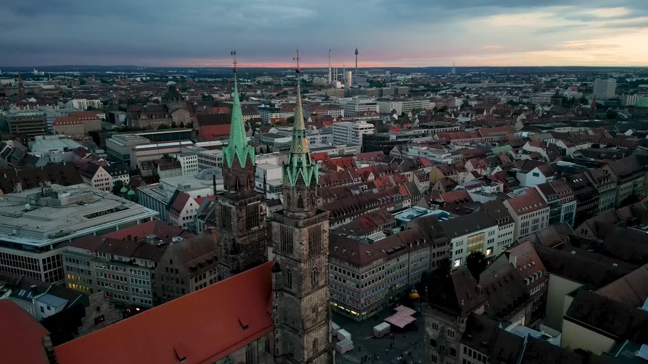 4K Aerial Drone Video of the Historic Buildings of Downtown Nurnberg, Germany featuring Nuremberg State Theater and St. Lorenz Church