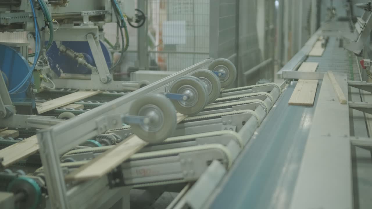 Wooden Planks Moving on Automated Conveyor Belt in Factory