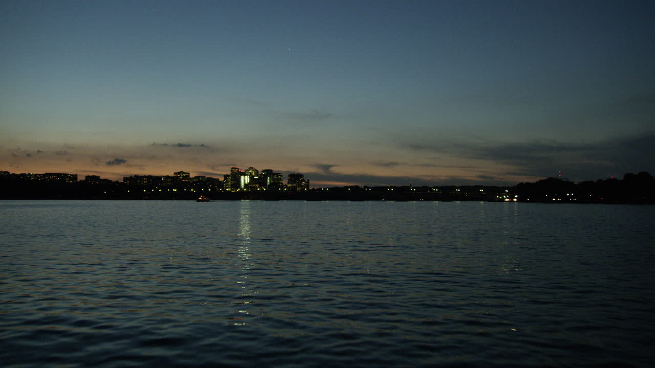 Potomac river at sunrise from boat perspective.