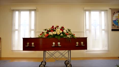 closeup-shot-of-a-funeral-casket-in-a-hearse-or-chapel-or-burial-at-cemetery