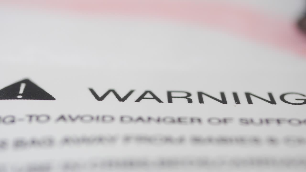 Warning label about suffocation danger
