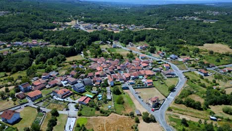 aerial footage of etnographic event in village in woods from lonoa spain