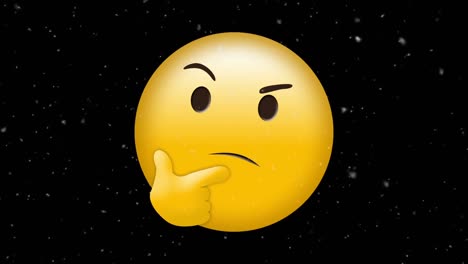 digital animation of white particles falling over thinking face emoji against black background