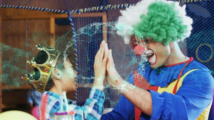 Animazione di un cervello digitale su bambini di diverse etnie e un clown a una festa di compleanno