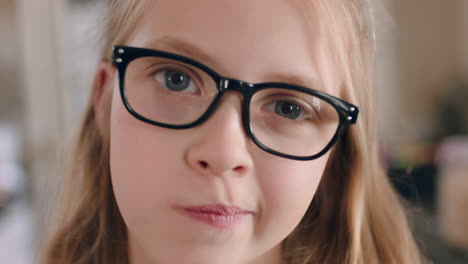 portrait-beautiful-happy-girl-wearing-glasses-making-faces-looking-at-camera-with-bored-expression