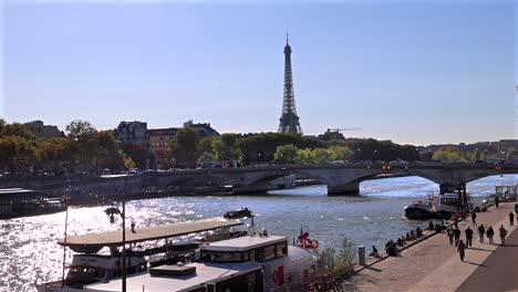 time-lapse of transportation on seine river paris, france video eiffel tower