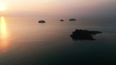 Aerial view of the stunning Koh Chang Islands at sunset, sunrise, beautiful sky and horizon, ocean, copy space