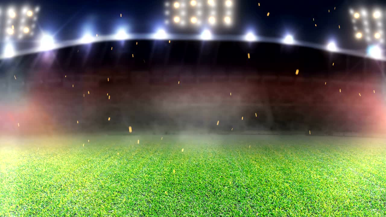 축구장과 밝은 스포트라이트.