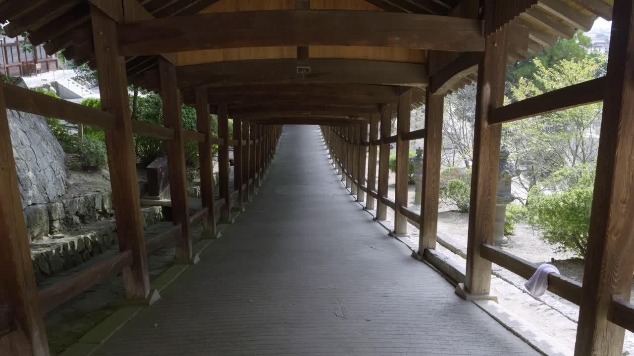 POV walking through Kibitsu Shrine corridor in Japan