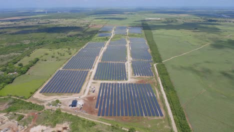 High-angle-aerial-drone-pov-of-El-Soco-solar-photovoltaic-park-of-San-Pedro-De-Macoris-in-Dominican-Republic