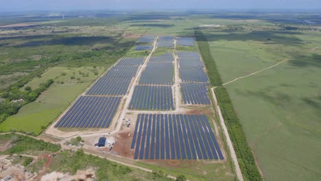 high angle aerial drone pov of el soco solar photovoltaic park of san pedro de macoris in dominican republic