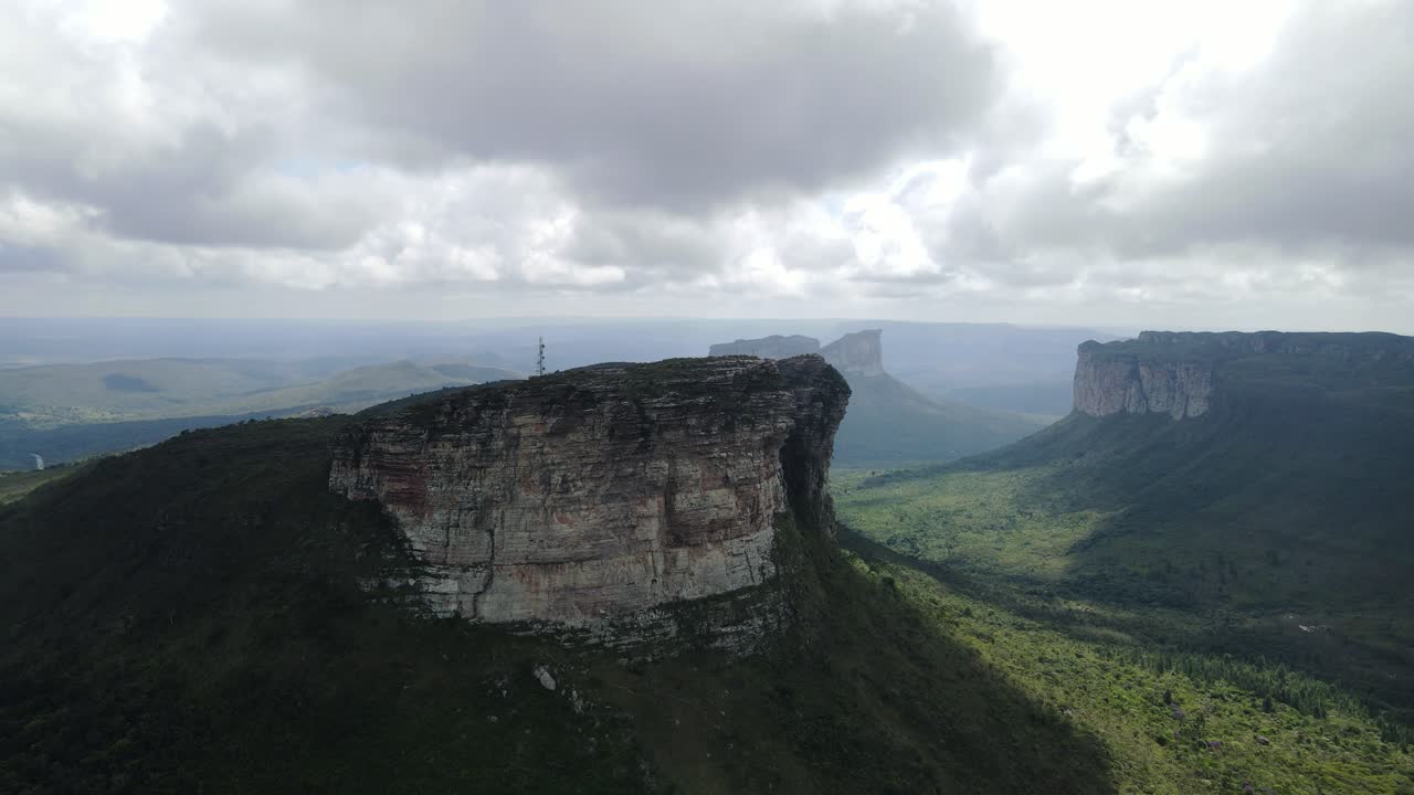 Beautiful Aerial view of Chapada Diamantina National Park, Morro do Pai Inacio from above. Beautiful View of Canyon Landscape. Jungle and Plateaus with clouds passing by.