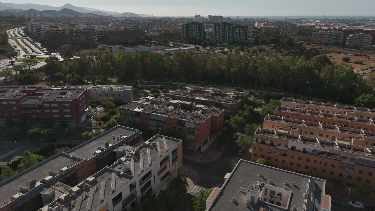Urban apartment block complex Spain modern architecture aerial drone new development