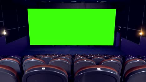 blank green screen in the cinema house.