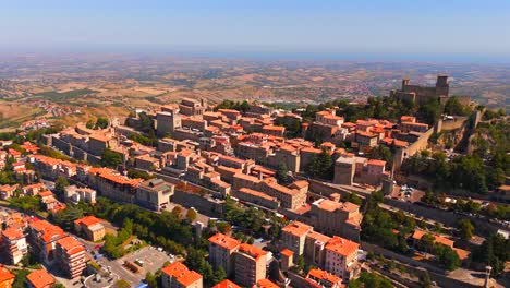 witness the breathtaking aerial beauty of san marino, with its iconic towers and picturesque countryside.