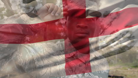 animación de la bandera de inglaterra sobre un soldado afroamericano