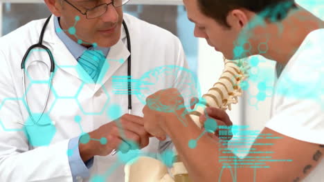 doctors examining spine model, medical data processing animation over them