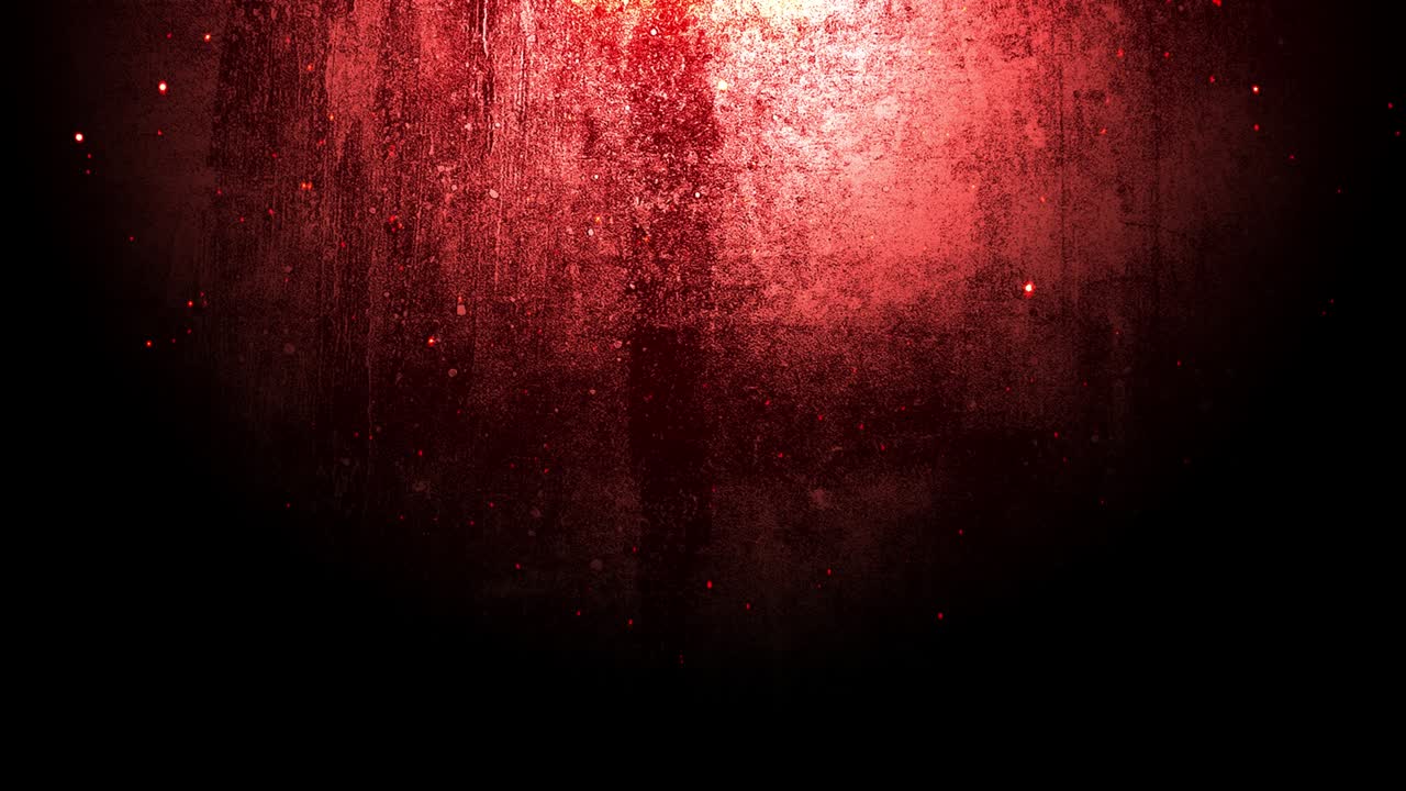 una pared de hierro rojo de aspecto grunge con partículas de polvo flotando en primer plano.