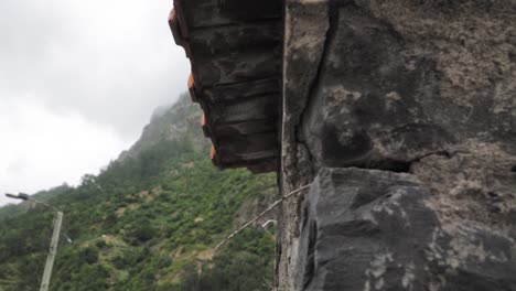 old stone building with mountain view