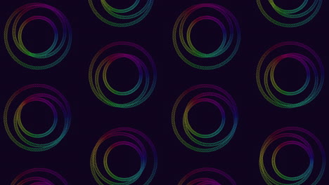 Colorful spiral pattern of overlapping circles on black background