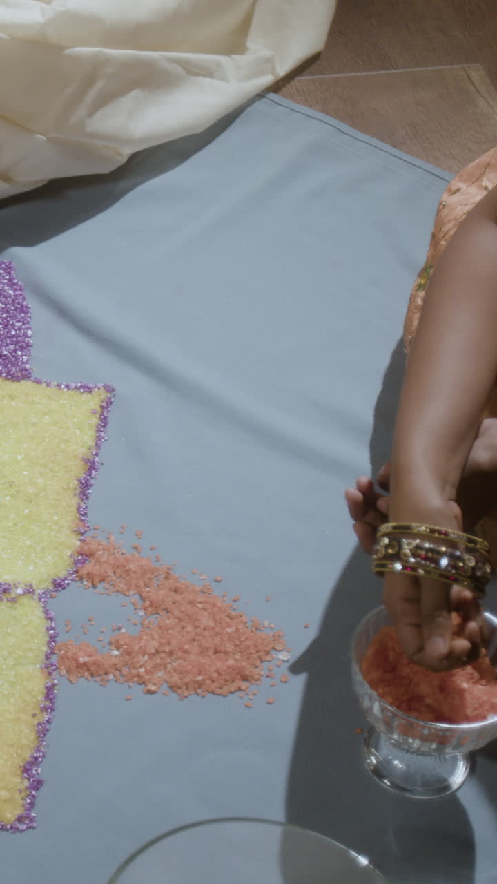 Creating a Colorful Rangoli with Colored Sand