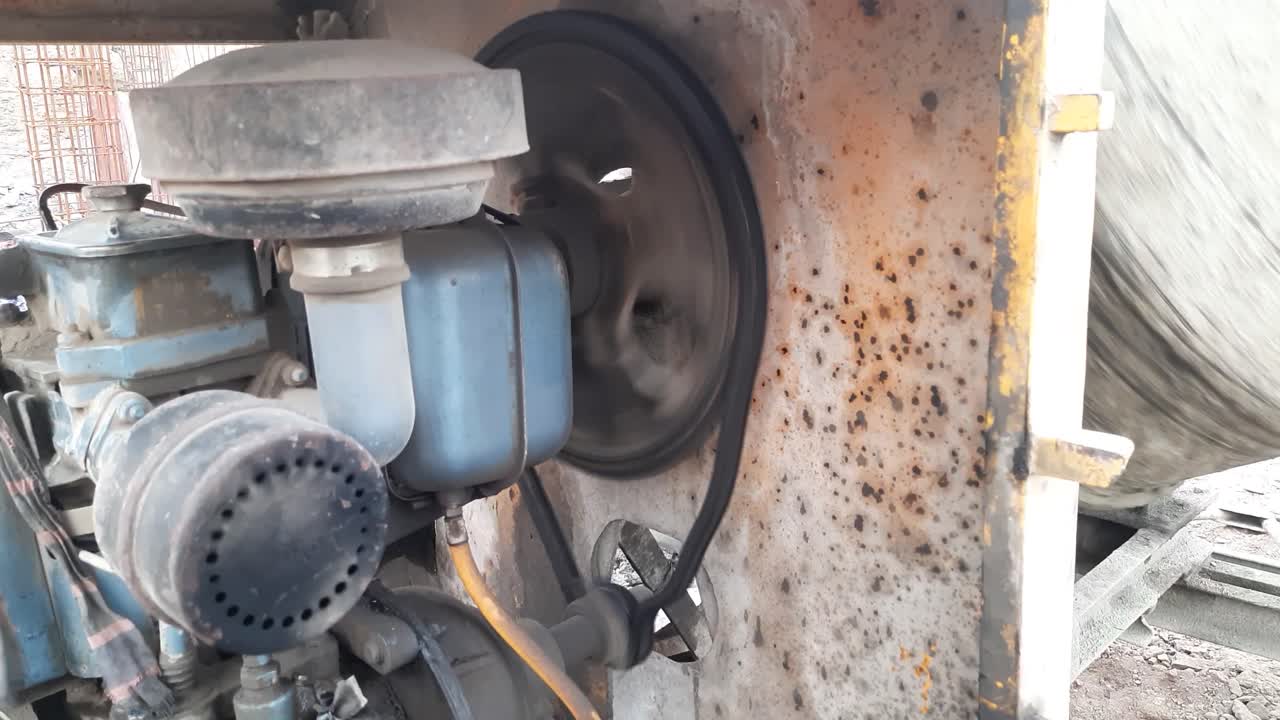 Diesel Engine Of Cement Concrete Mixer Machine In Working condition