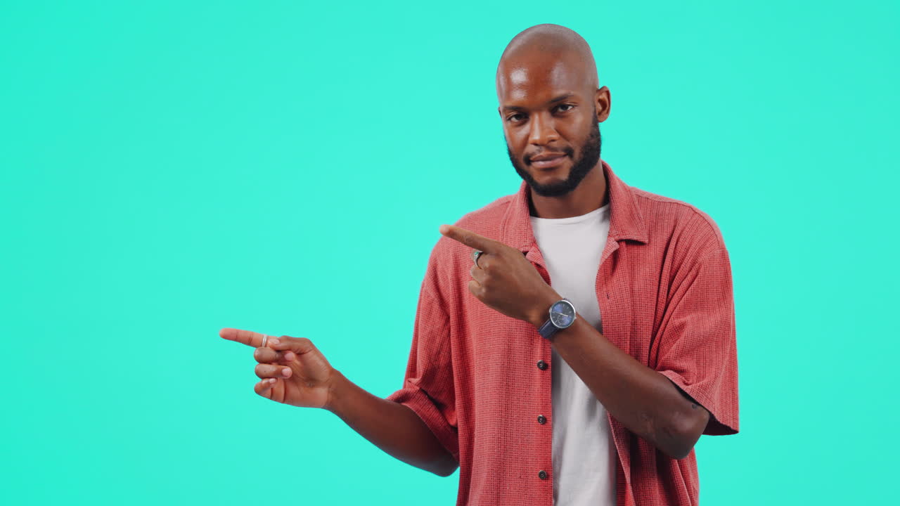 Marketing, pointing and man in studio with mockup
