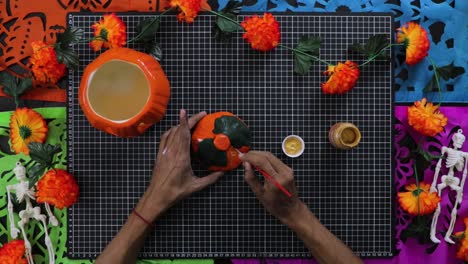 painting and details of pumpkins in preparation for halloween