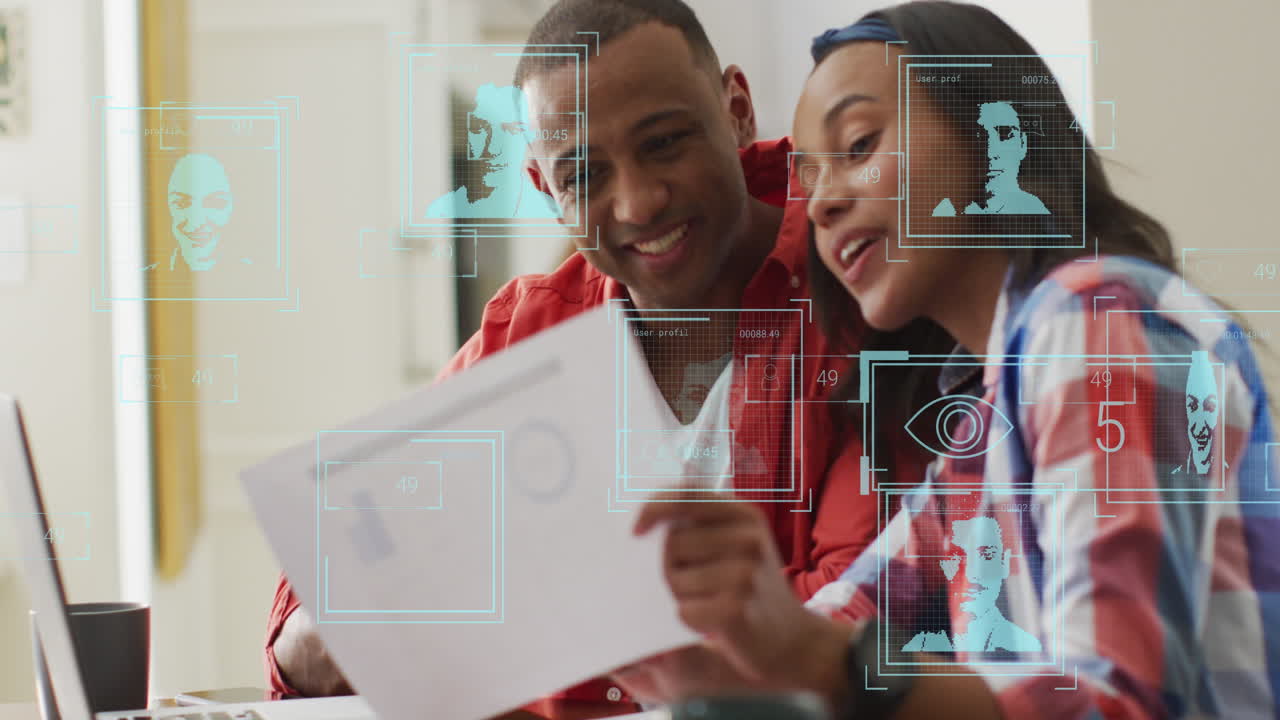 Animation of profile icons over african american man and woman discussing over document at office