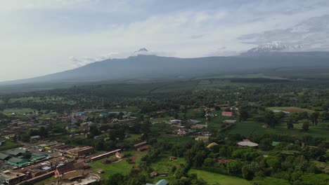 loitokitok town in a view of the tanzania highest mountain, mount kilimanjaro in kenya - aerial drone shot