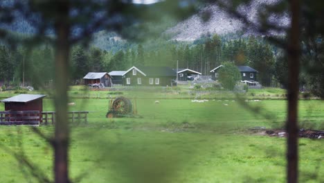 a small farm at the mountain foothills