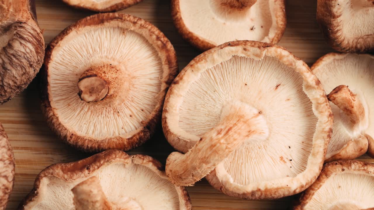 Fresh Shiitake Mushrooms on Wooden Board