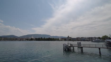 a small pier on a river in geneva, switzerland