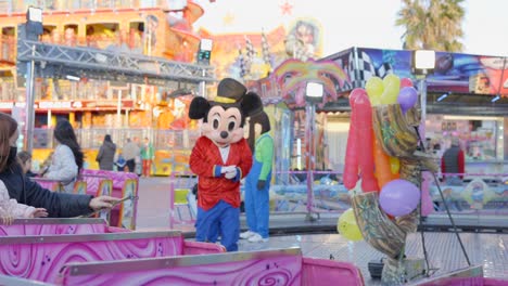 mickey mouse character at a carnival