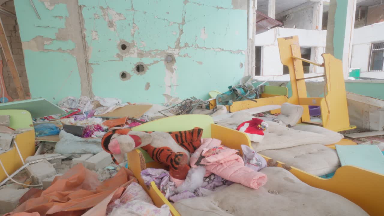 A building with a kindergarten destroyed by shelling and explosions. War in Ukraine.