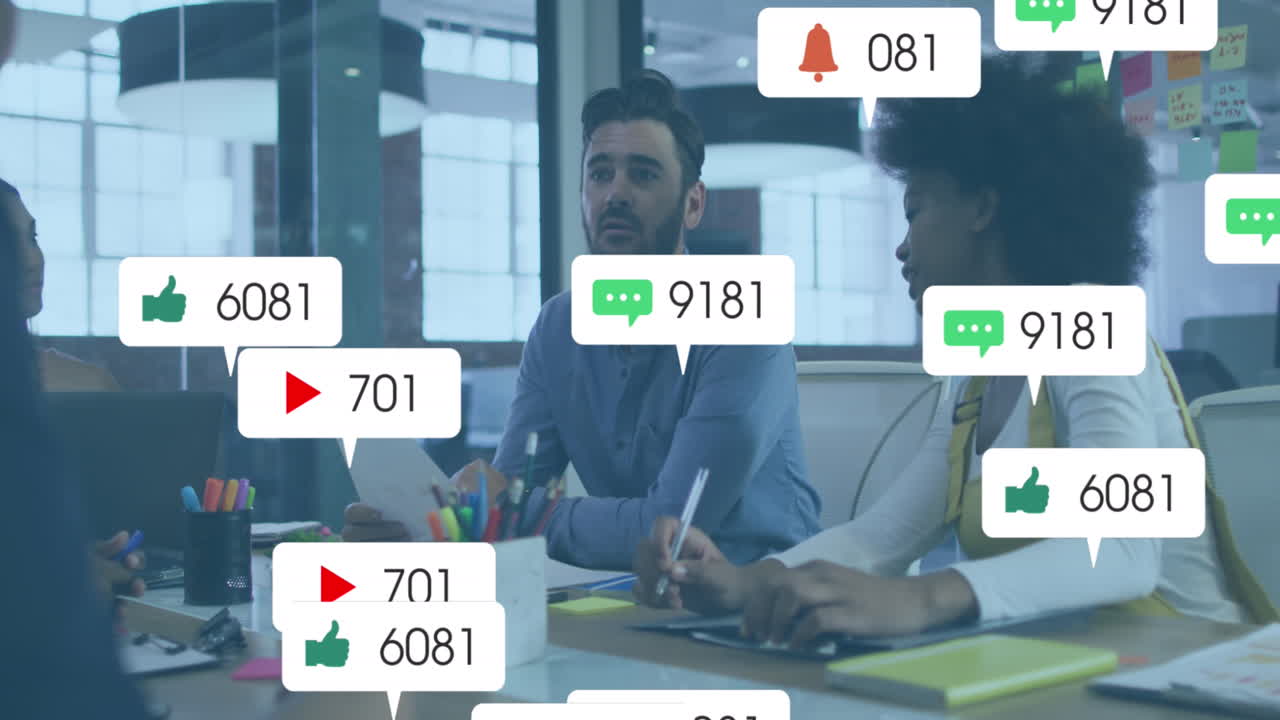 Animation of social media icons and data processing over diverse business people in office