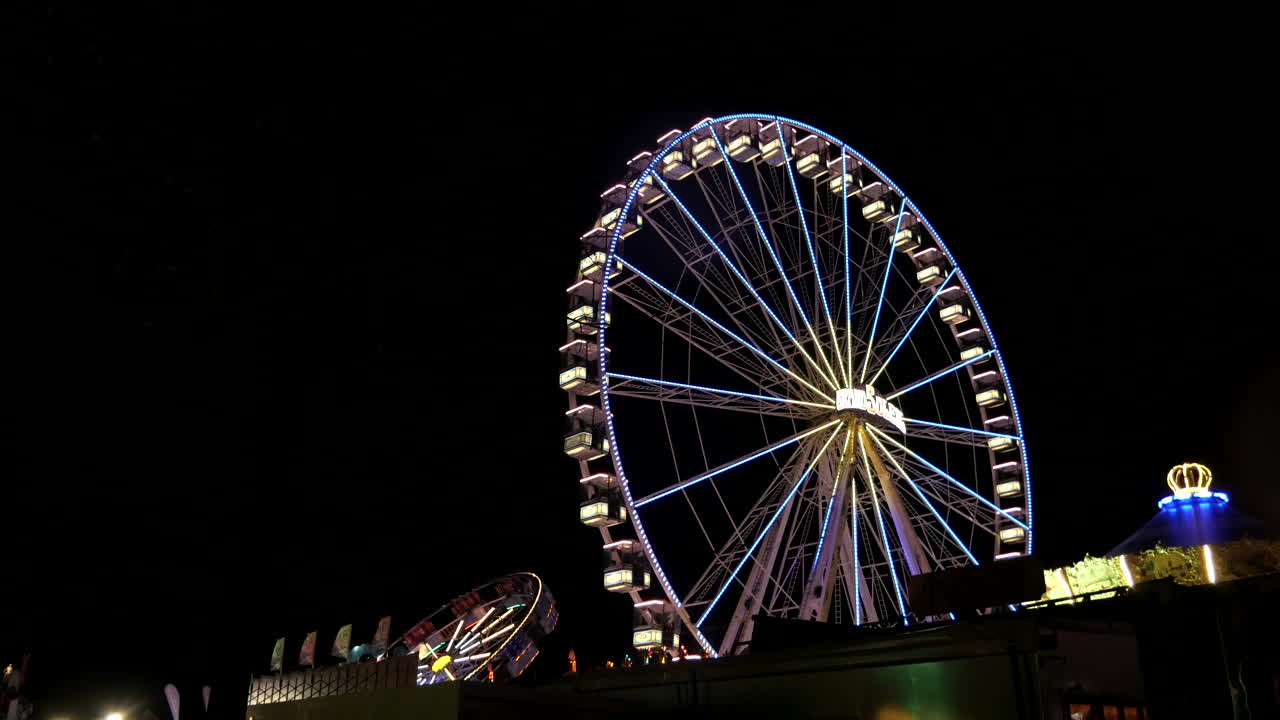 Illuminated Ferris Wheel at Night