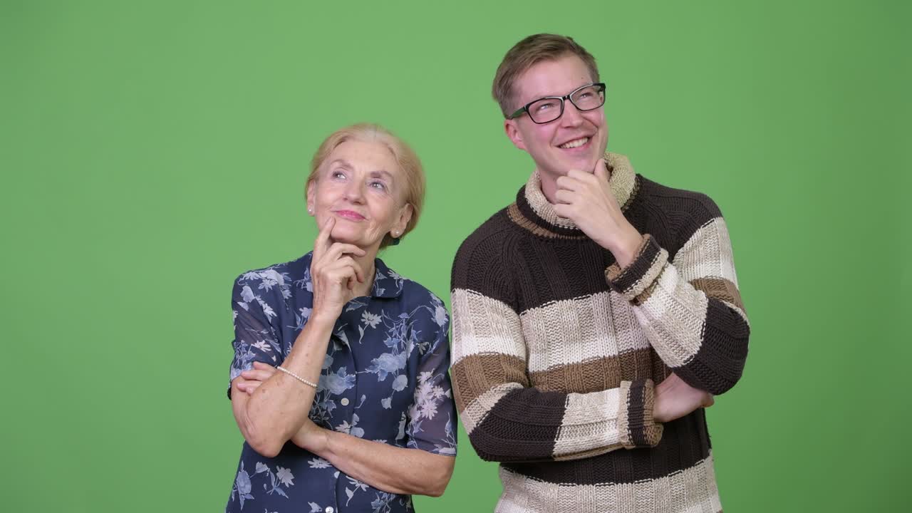 Happy grandmother and grandson thinking together